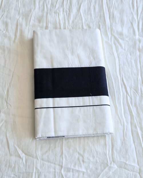 9cm black border Kerala saree folded — ivory cotton handloom Canada — Atelier Soza