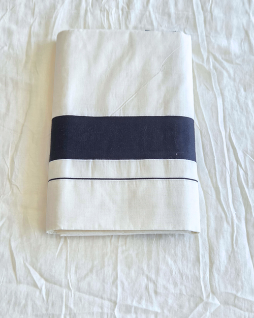  black border Kerala saree folded — ivory cotton handloom Canada — Atelier Soza