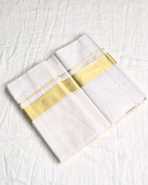 Broad kasavu double mundu angled fold — dense gold zari border, Balaramapuram handloom cotton Canada — Atelier Soza