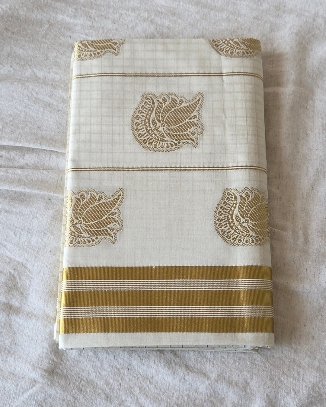 peacock butta kasavu Kerala saree packaged — gold check body — Atelier Soza Canada