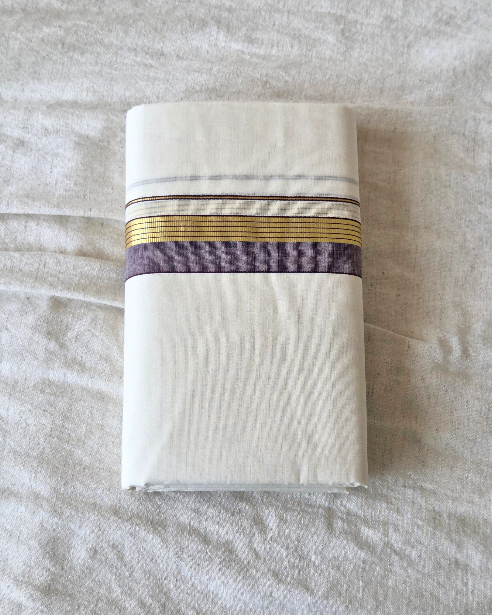 Broad kasavu double mundu angled fold — dense gold zari border, Balaramapuram handloom cotton Canada — Atelier Soza